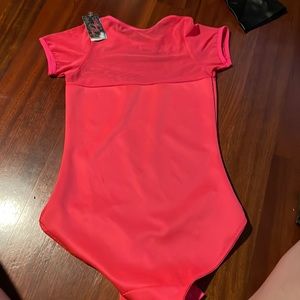 Hot pink body suit